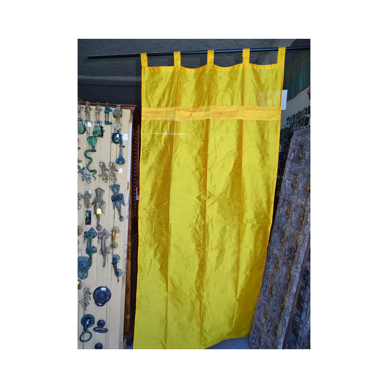 Orange-yellow taffeta curtains with a brocade band